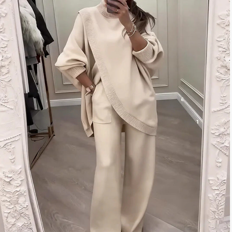 🔥【Akcija omejena – Popust do 50%】✨Eleganten ženski komplet – pleten pulover z visokim ovratnikom in križnim dizajnom + hlače s širokimi hlačnicami, izjemno udoben