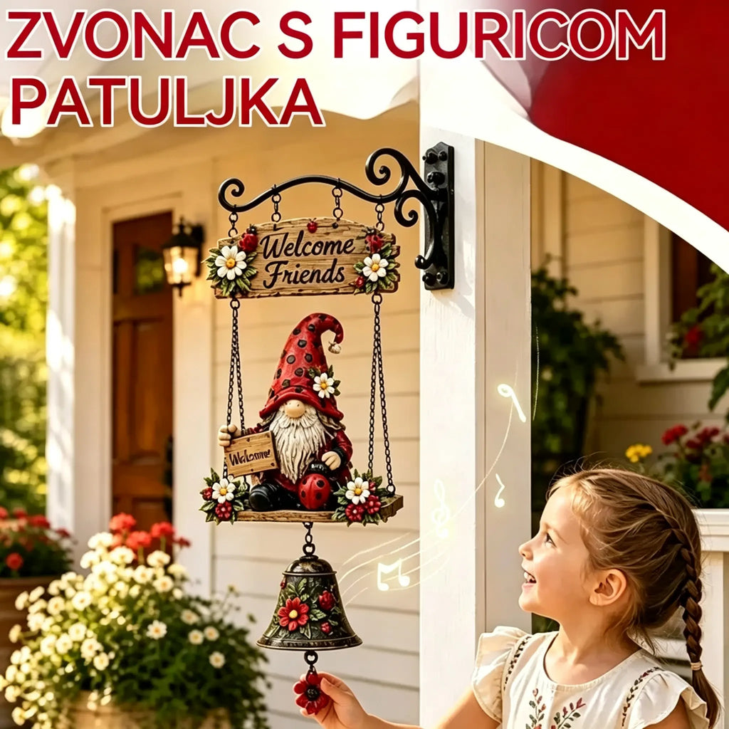 Zvono dobrodošlice s motivom vrtnog patuljka, natpisom "Dobrodošli", vintage brončano zvono, dizajn zida od kovanog željeza i vrtna dekoracija.