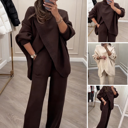 🔥【Akcija omejena – Popust do 50%】✨Eleganten ženski komplet – pleten pulover z visokim ovratnikom in križnim dizajnom + hlače s širokimi hlačnicami, izjemno udoben