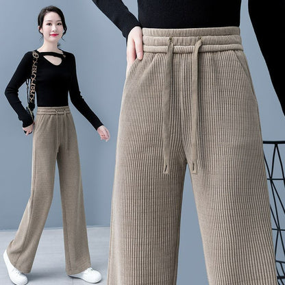 🔥【Népszerű termék – Akár 50% kedvezmény】Női bársonyos casual bőszárú nadrág, rendkívül kényelmes viselet